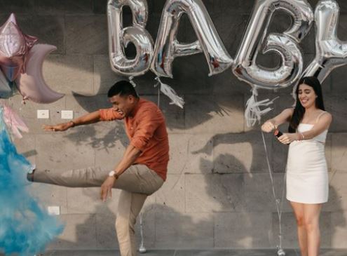 Jesus Gallardo celebrating a baby shower with his girlfriend